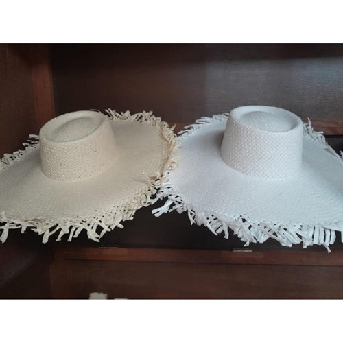 Frayed straw hat boho beach style for vacations and festivals